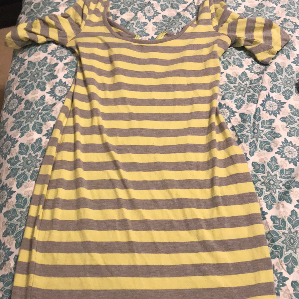 a light  green gray dress